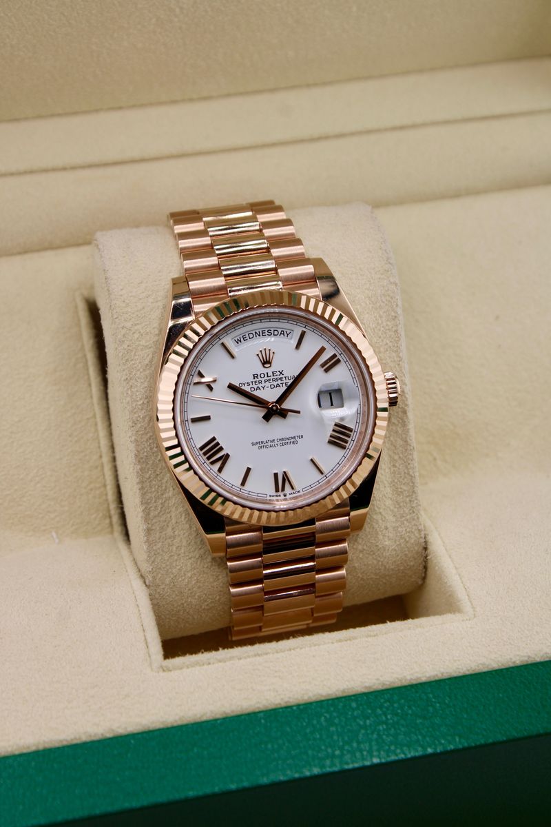 Rolex Day-Date 40 Everose Gold White Roman Dial 228235, dial straight on
